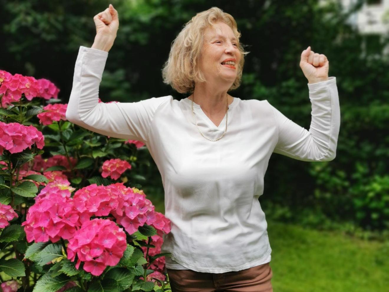 a person holding a flower