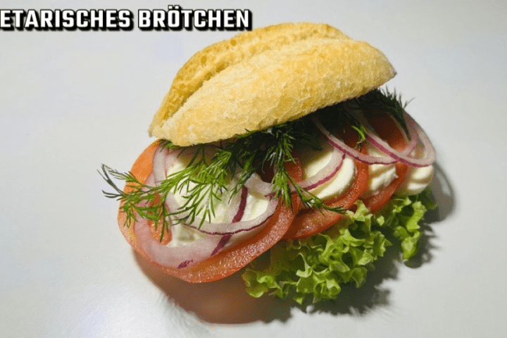 a sandwich cut in half on a plate