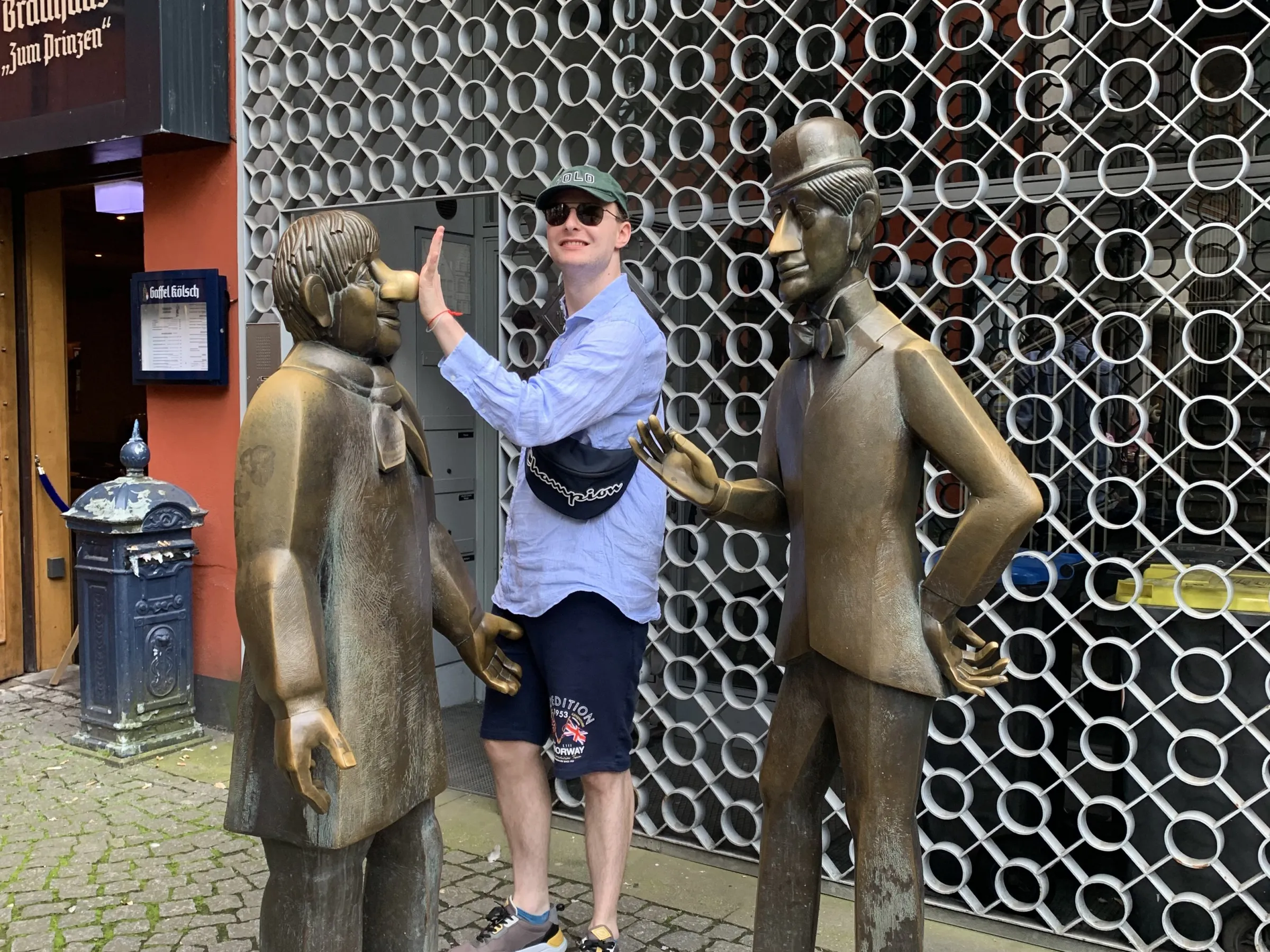 a group of people standing in front of a building