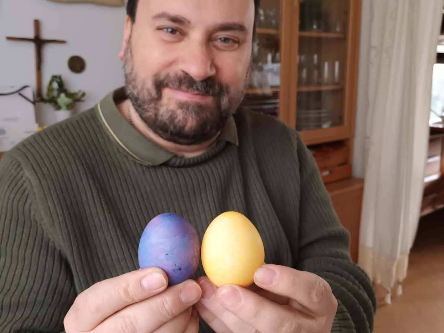 a man holding an egg