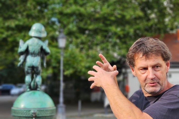 a man talking on a cell phone