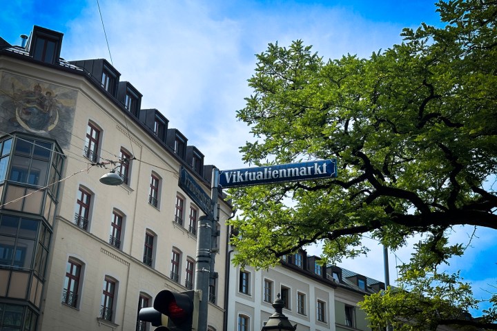a street sign in front of a building