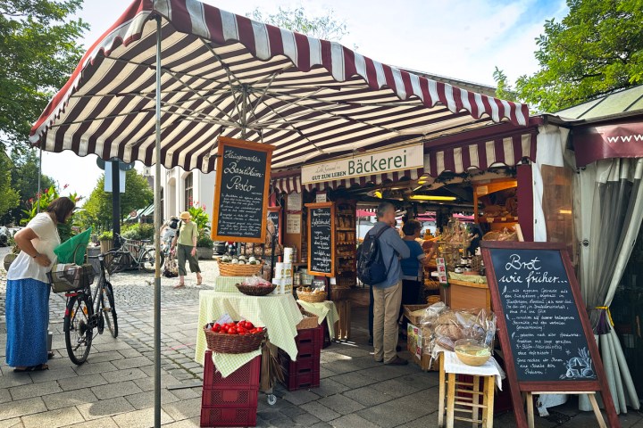 a group of people standing outside of a building