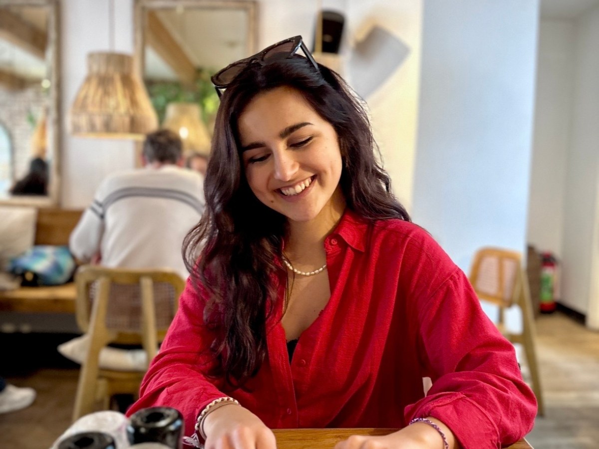 a woman sitting at a table