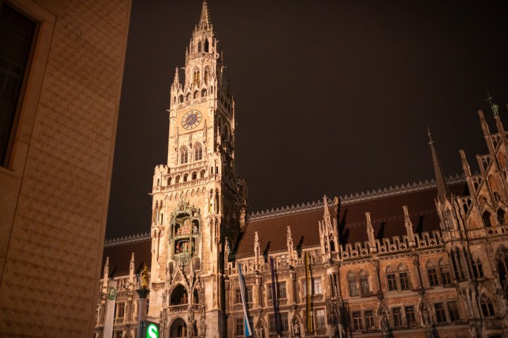 a large clock tower towering over a city