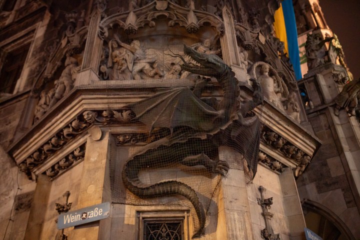 a large clock mounted to the side of a building
